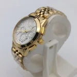ساعت مچی زنانه سیکو طلایی صفحه سفید بند استیل طرح سه موتور با تقویم و موتور ژاپن - تصویر 2
