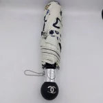 چتر اتوماتیک برند چنل CHANEL ضد باد با پارچه نانو و جعبه کادویی رنگ کرم نخودی - تصویر 4