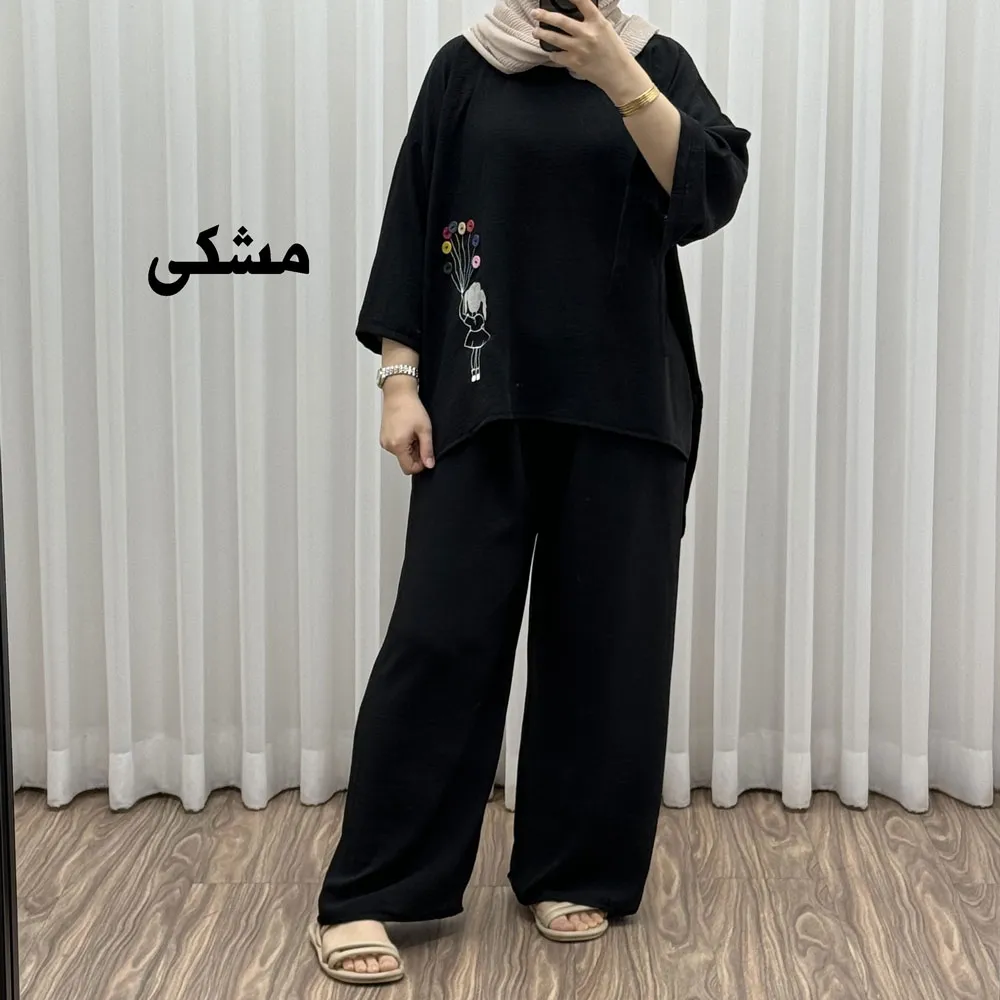 1776004157-69dbac3d4a5cc-مشکی ست بلوز شلوار بادکنکی فری سایز تا 52 ابر و باد چهارفصل شیک و راحت بدون آبرفت و رنگ رفتگی - تصویر 1