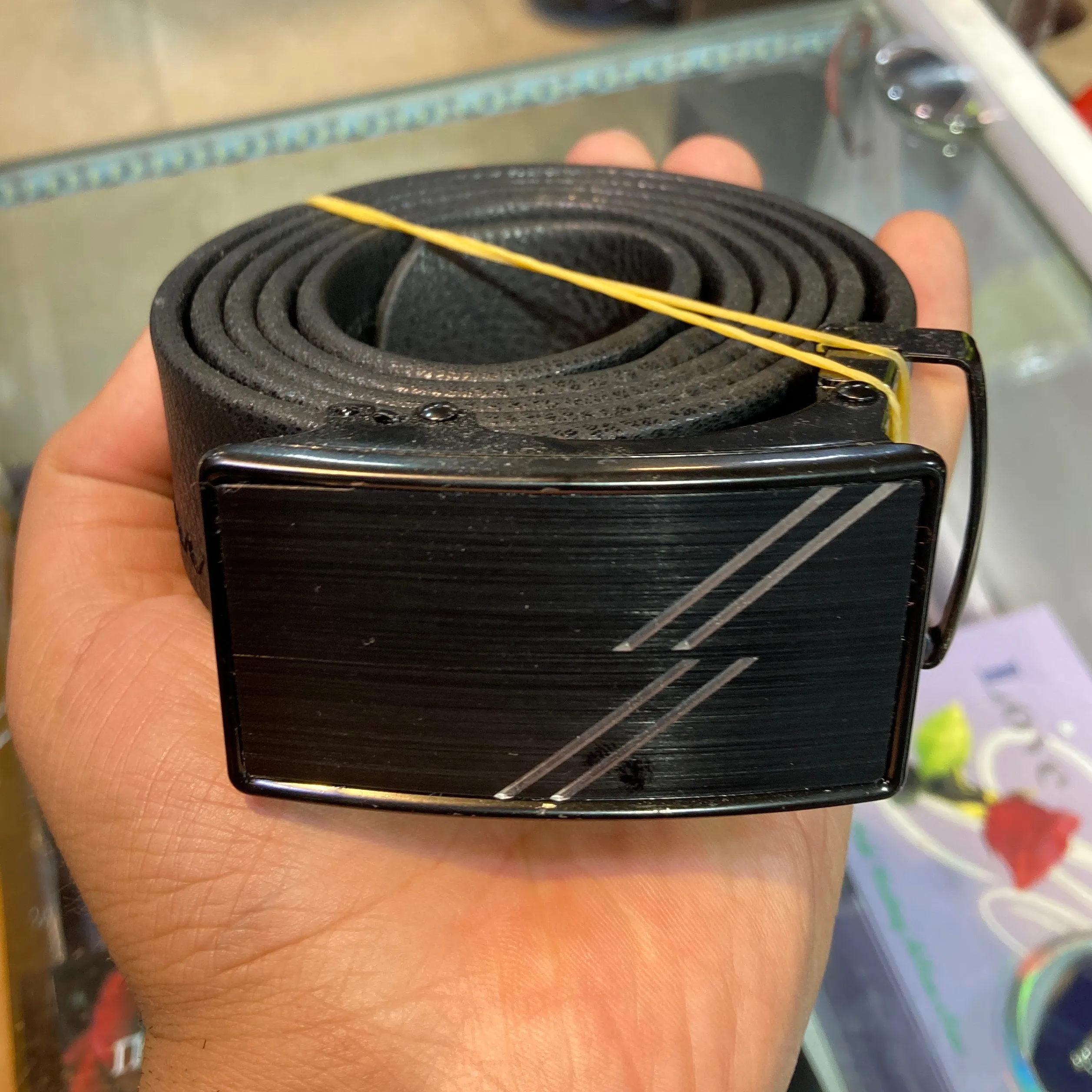 1e30d2a4-4fbb-4b71-b427-3dd5a6991ea6 کمربند چرم ریلی مردانه مشکی سگک مستطیل طول 120 سانتیمتر - Image 1