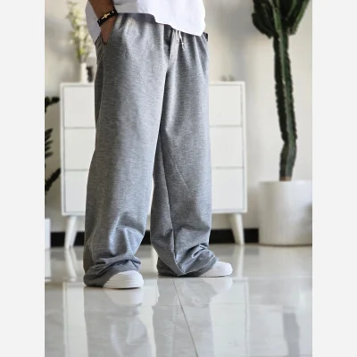 شلوار اسلش فول بگ پارچه ملانژ خنک رنگ طوسی و مشکی سایز بزرگ XXL و XXXL