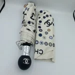 چتر اتوماتیک برند چنل CHANEL ضد باد با پارچه نانو و جعبه کادویی رنگ کرم نخودی - تصویر 9