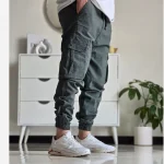 شلوار شش جیب مردانه پارچه نیل سایز 50 تا 60 رنگ طوسی مشکی سبز - Image 12