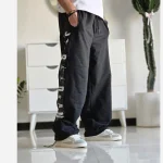 شلوار اسلش بگ جردن دمپا گت دار رنگ مشکی پارچه گلکسی اسپان سایز XXL XXXL - Image 4