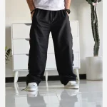 شلوار اسلش بگ جردن دمپا گت دار رنگ مشکی پارچه گلکسی اسپان سایز XXL XXXL - Image 2