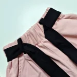 ست تیشرت و شلوارک دخترانه پنبهای سایز 7 تا 10 سال رنگ مشکی و کرم صورتی - Image 6