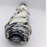 چتر اتوماتیک برند چنل CHANEL ضد باد با پارچه نانو و جعبه کادویی رنگ کرم نخودی - تصویر 5