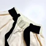 ست تیشرت و شلوارک دخترانه پنبهای سایز 7 تا 10 سال رنگ مشکی و کرم صورتی - Image 5