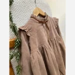پیراهن مخمل کبریتی دخترانه رنگ کرم مناسب 3 تا 10 سال - تصویر 5